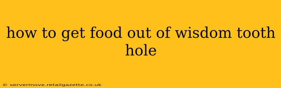 how to get food out of wisdom tooth hole