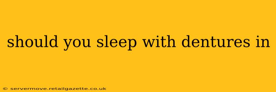 should you sleep with dentures in